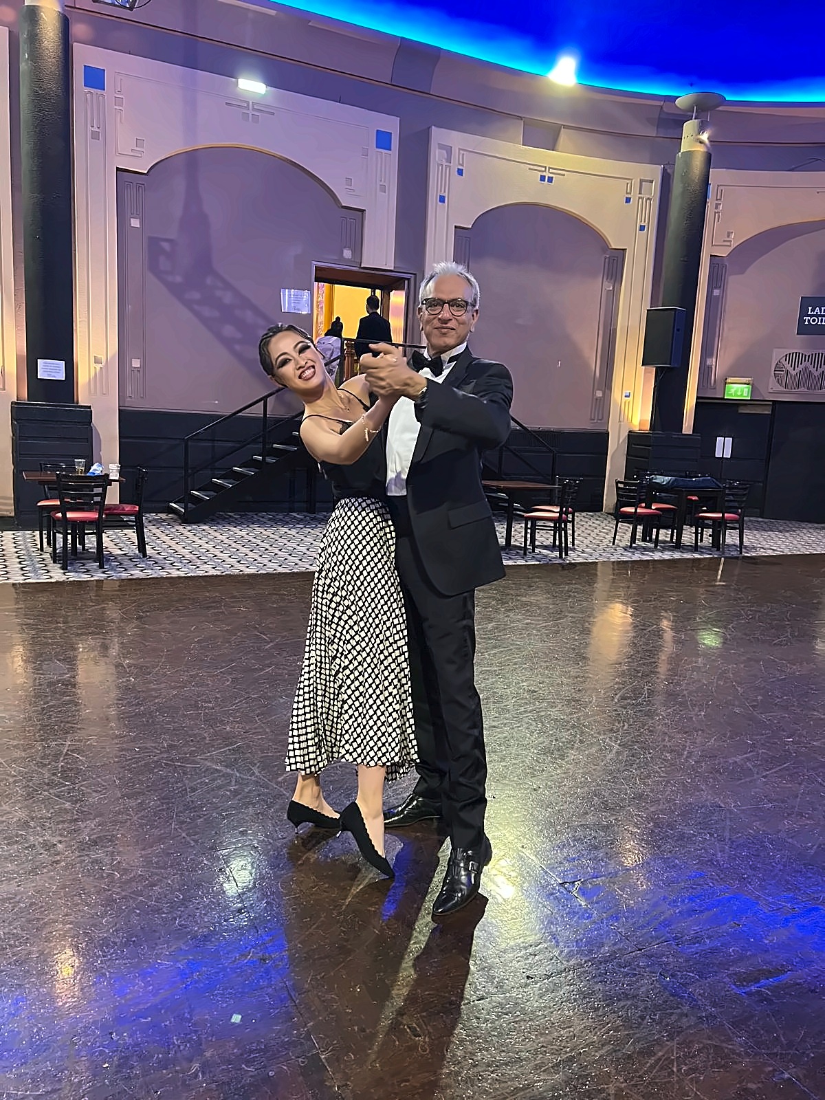 Amir Shafi dancing with a student